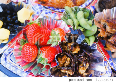 Hors d'oeuvres for New Year's dishes, material, background Hors d'oeuvres for New Year's dishes, material, background 122284075
