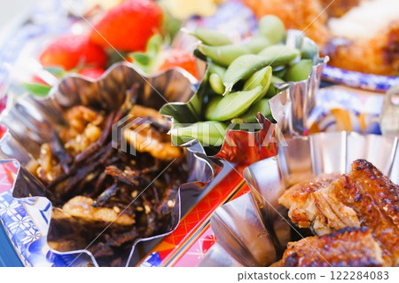 Hors d'oeuvres for New Year's dishes, material, background Hors d'oeuvres for New Year's dishes, material, background 122284083