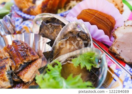 Hors d'oeuvres for New Year's dishes, material, background Hors d'oeuvres for New Year's dishes, material, background 122284089