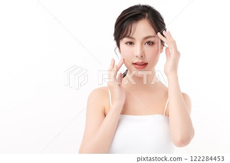 Beautiful young asian woman with clean fresh skin on white background, Face care, Facial treatment, Cosmetology, beauty and spa, Asian women portrait. Beautiful young asian woman with clean fresh skin on white background, Face care, Facial treatment, Cosmetology, beauty and spa, Asian women portrait. 122284453