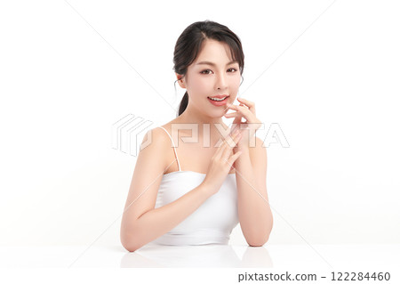 Beautiful young asian woman with clean fresh skin on white background, Face care, Facial treatment, Cosmetology, beauty and spa, Asian women portrait. Beautiful young asian woman with clean fresh skin on white background, Face care, Facial treatment, Cosmetology, beauty and spa, Asian women portrait. 122284460