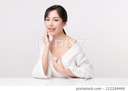 Beautiful young asian woman with clean fresh skin on white background, Face care, Facial treatment, Cosmetology, beauty and spa, Asian women portrait. Beautiful young asian woman with clean fresh skin on white background, Face care, Facial treatment, Cosmetology, beauty and spa, Asian women portrait. 122284466