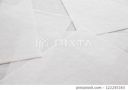 Overlapping thin white paper 122285163
