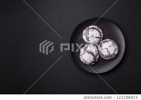 Sweet chocolate crinkle cookies made at home 122286923