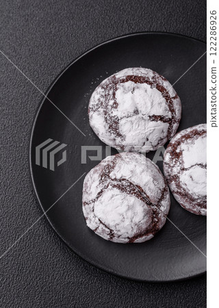 Sweet chocolate crinkle cookies made at home Sweet chocolate crinkle cookies made at home 122286926