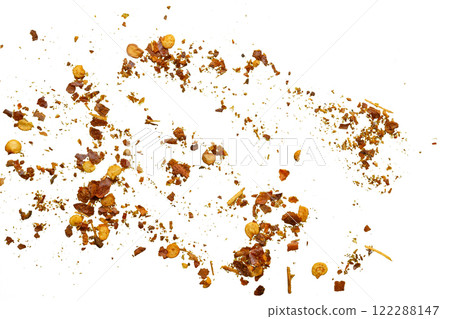 dried red chili pepper flakes and seeds isolated on white background dried red chili pepper flakes and seeds isolated on white background 122288147