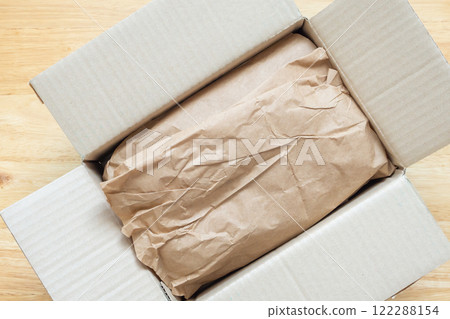 Eco friendly brown paper texture wrap background for product packaging parcel carton box 122288154
