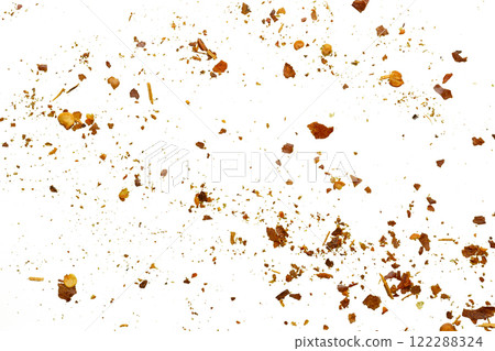 dried red chili pepper flakes and seeds isolated on white background dried red chili pepper flakes and seeds isolated on white background 122288324