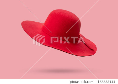 Woman red summer hat isolated on pink background 122288433