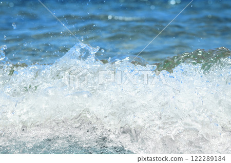 Soft ocean wave. Water movement. Close up of gentle ocean wave. 122289184