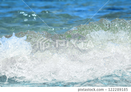 Soft ocean wave. Water movement. Close up of gentle ocean wave. Soft ocean wave. Water movement. Close up of gentle ocean wave. 122289185