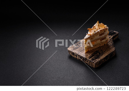 Layered sweet cake with cream, pear and dorblu cheese 122289723