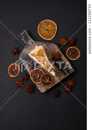 Layered sweet cake with cream, pear and dorblu cheese Layered sweet cake with cream, pear and dorblu cheese 122289734