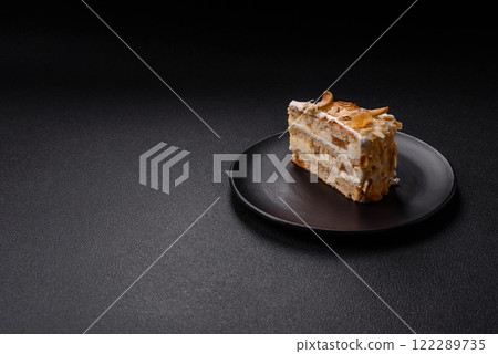 Layered sweet cake with cream, pear and dorblu cheese Layered sweet cake with cream, pear and dorblu cheese 122289735