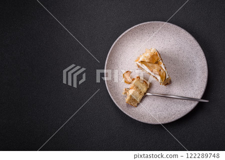 Layered sweet cake with cream, pear and dorblu cheese Layered sweet cake with cream, pear and dorblu cheese 122289748