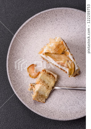 Layered sweet cake with cream, pear and dorblu cheese Layered sweet cake with cream, pear and dorblu cheese 122289753