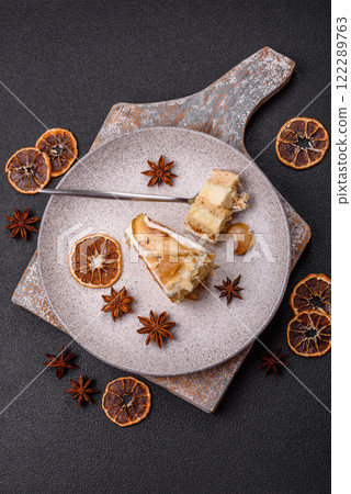 Layered sweet cake with cream, pear and dorblu cheese 122289763