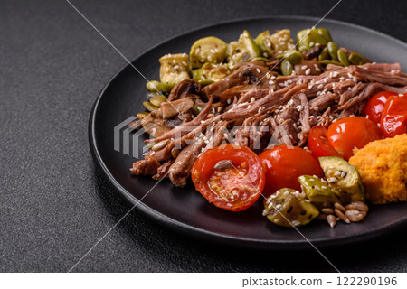 Boiled beef with vegetables, grains, seeds and spices 122290196