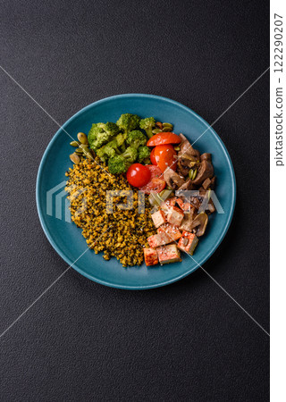 Quinoa bowl with tofu, steamed vegetables, grains, seeds and spices Quinoa bowl with tofu, steamed vegetables, grains, seeds and spices 122290207