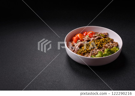 Quinoa bowl with tofu, steamed vegetables, grains, seeds and spices 122290216