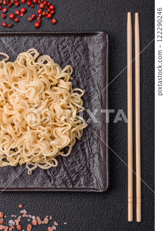 Rice noodles, asian food with soy sauce and spices Rice noodles, asian food with soy sauce and spices 122290246