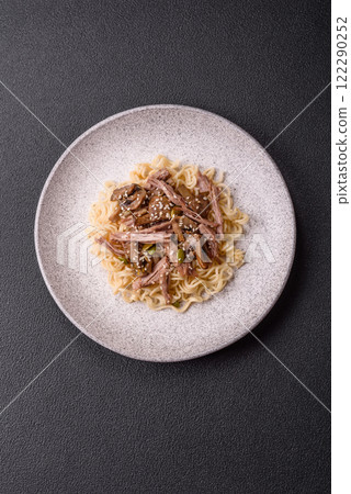 Rice noodles, asian food with soy sauce and spices 122290252