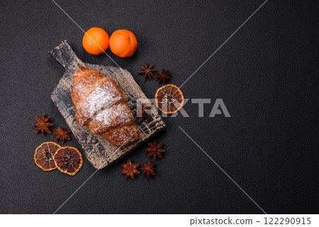 Fresh crispy sweet croissant with chocolate filling Fresh crispy sweet croissant with chocolate filling 122290915