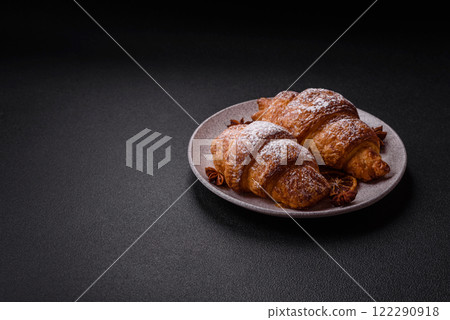 Fresh crispy sweet croissant with chocolate filling 122290918