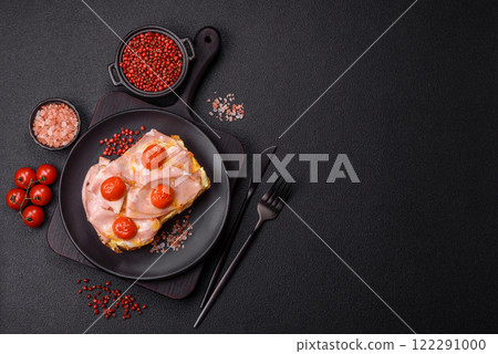 Sandwich with brioche, meat, melted cheese, ham, tomatoes, salt, spices and herbs Sandwich with brioche, meat, melted cheese, ham, tomatoes, salt, spices and herbs 122291000