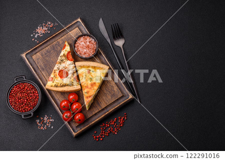 Delicious quiche with broccoli, cheese, chicken, spices and herbs 122291016