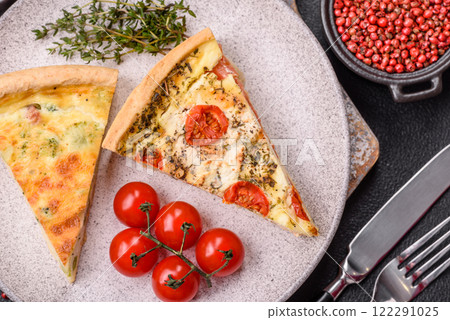 Delicious quiche with broccoli, cheese, chicken, spices and herbs 122291025