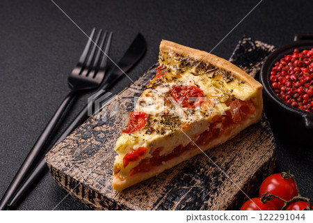 Delicious crispy quiche cut into slices with cheese, broccoli, tomatoes Delicious crispy quiche cut into slices with cheese, broccoli, tomatoes 122291044