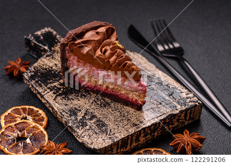 A piece of sweet cheesecake with mascarpone cheese, strawberry flavor A piece of sweet cheesecake with mascarpone cheese, strawberry flavor 122291206