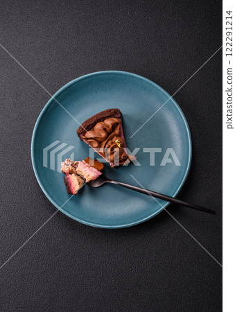 A piece of sweet cheesecake with mascarpone cheese, strawberry flavor 122291214