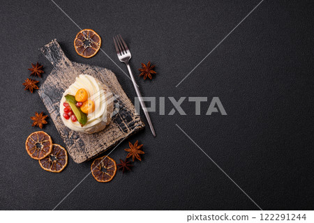 Piece of sweet meringue with citrus, kiwi and pomegranate seeds Piece of sweet meringue with citrus, kiwi and pomegranate seeds 122291244