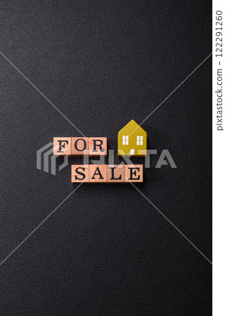The inscription for sale laid out with wooden cubes The inscription for sale laid out with wooden cubes 122291260