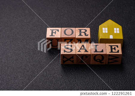 The inscription for sale laid out with wooden cubes The inscription for sale laid out with wooden cubes 122291261