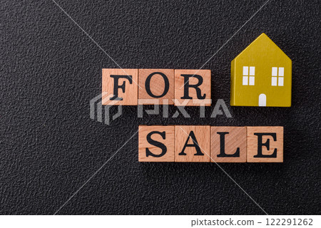 The inscription for sale laid out with wooden cubes The inscription for sale laid out with wooden cubes 122291262