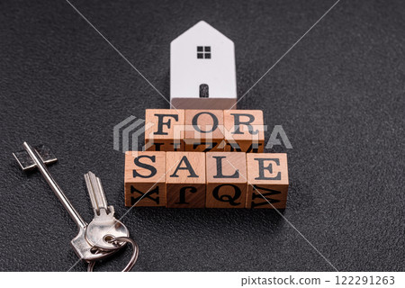 The inscription for sale laid out with wooden cubes The inscription for sale laid out with wooden cubes 122291263