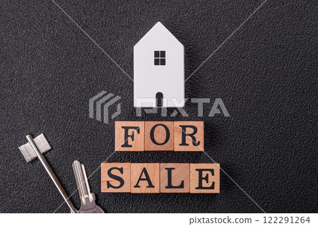 The inscription for sale laid out with wooden cubes The inscription for sale laid out with wooden cubes 122291264