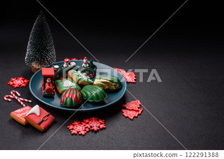 Sweet Madeleines desserts covered with chocolate in Christmas colors 122291388
