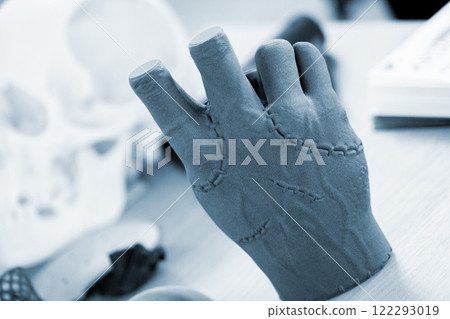 Hand printed on a 3D printer from polyamide powder. Three-dimensiona model of a human hand created on a 3D printer from plastic. Modern additive technologies. 3d printing technology. Manufacturing 122293019