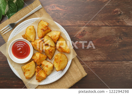 Image of hand-cut French fries 122294298
