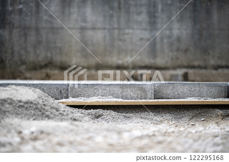 Construction foundation for pavement of a sidewalk Construction foundation for pavement of a sidewalk 122295168