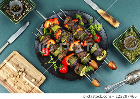 Roasted meat skewers. Roasted meat skewers. 122297466