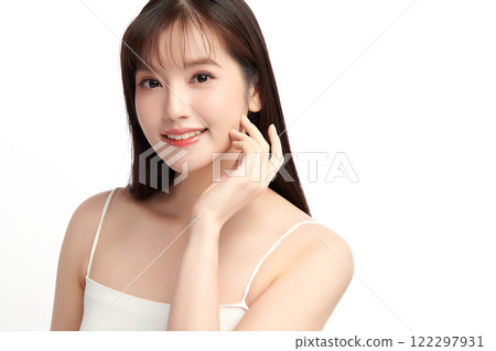 Beautiful young asian woman with clean fresh skin on white background, Face care, Facial treatment, Cosmetology, beauty and spa, Asian women portrait. Beautiful young asian woman with clean fresh skin on white background, Face care, Facial treatment, Cosmetology, beauty and spa, Asian women portrait. 122297931