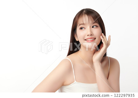 Beautiful young asian woman with clean fresh skin on white background, Face care, Facial treatment, Cosmetology, beauty and spa, Asian women portrait. Beautiful young asian woman with clean fresh skin on white background, Face care, Facial treatment, Cosmetology, beauty and spa, Asian women portrait. 122297935