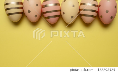 Easter eggs on yellow background Easter eggs on yellow background 122298525