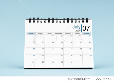 July 2025 Monthly desk calendar for 2025 year on soft blue background. 122298639