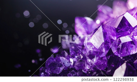 Violet Crystals Reflecting Light on Dark Surface Violet Crystals Reflecting Light on Dark Surface 122298938